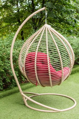 бежеве кругле крісло гойдалка Кит ЮМК